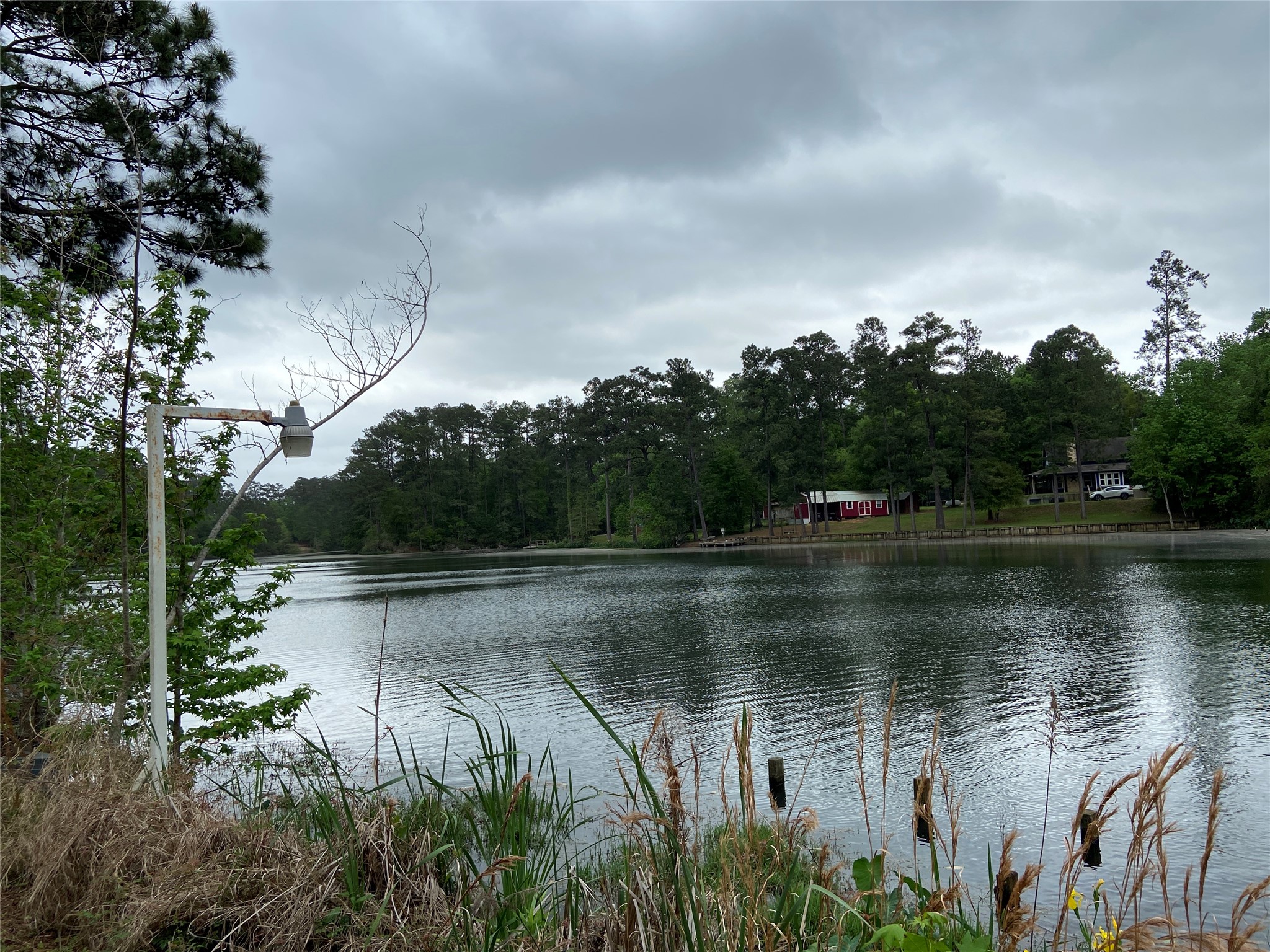321 Broken Arrow Trail Goodrich, TX 77335 - Photo 1 of 31 Beautiful private lake just steps from your back door