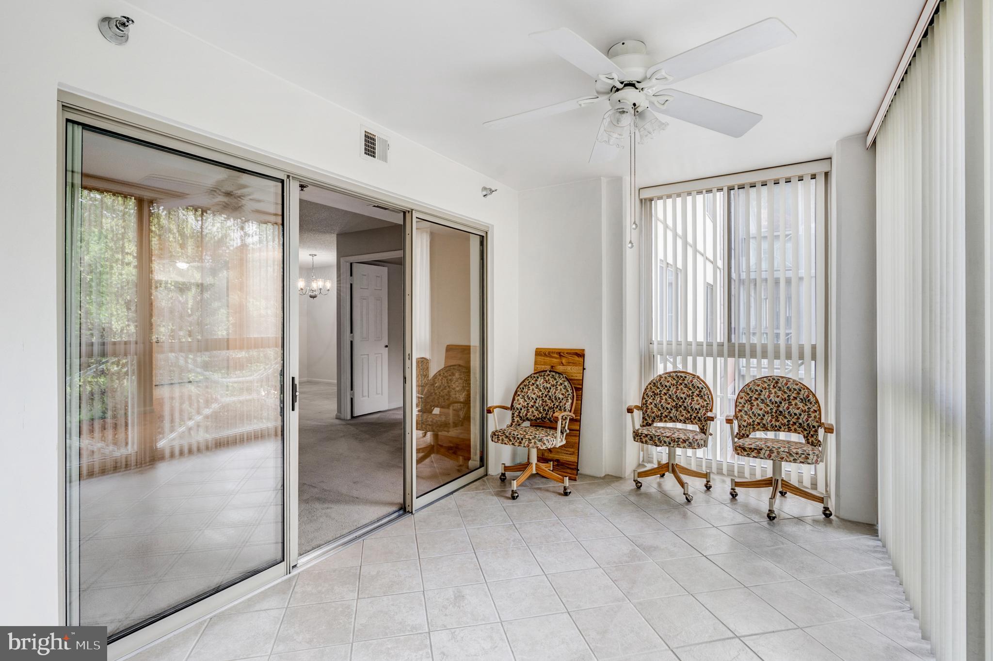 14809 Pennfield Circle, Unit 302 Silver Spring, MD 20906 - Photo 12 of 40 Relaxing Sun Room with Verticals