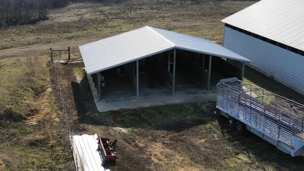 a view of a backyard of the house