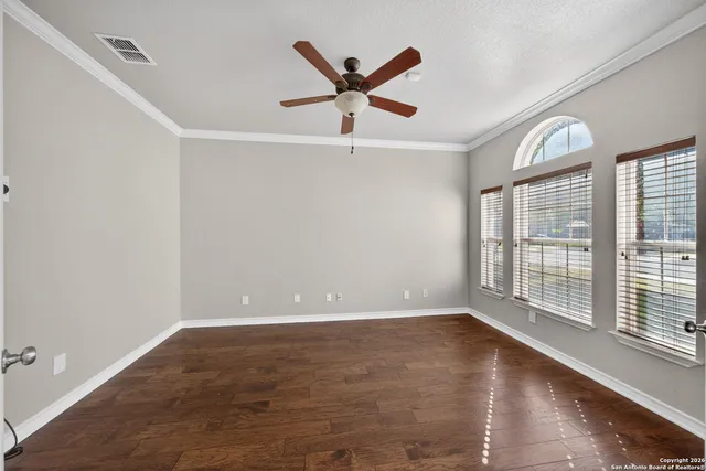 wooden floor in a room with a window