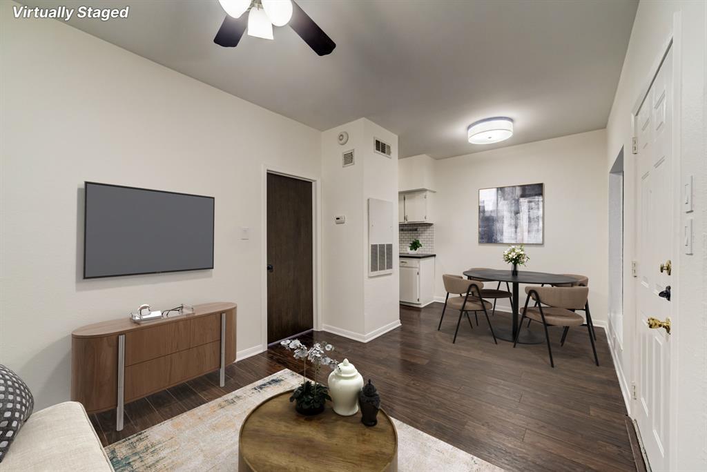 3316 Guadalupe Street, Unit 219 Austin, TX 78705 - Photo 11 of 13 a living room with furniture and a flat screen tv