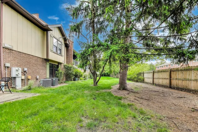 a view of a back yard of the house
