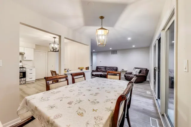 a view of a dining room and livingroom