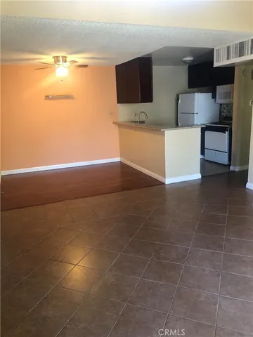 a view of kitchen and microwave