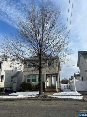 a view of a building with a street
