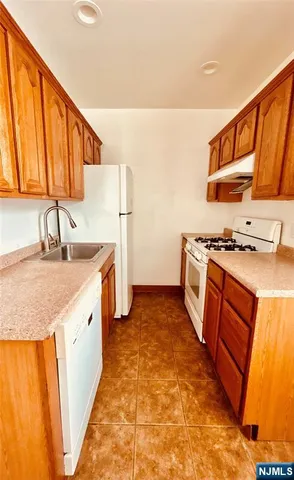 a view of front door with wooden floor