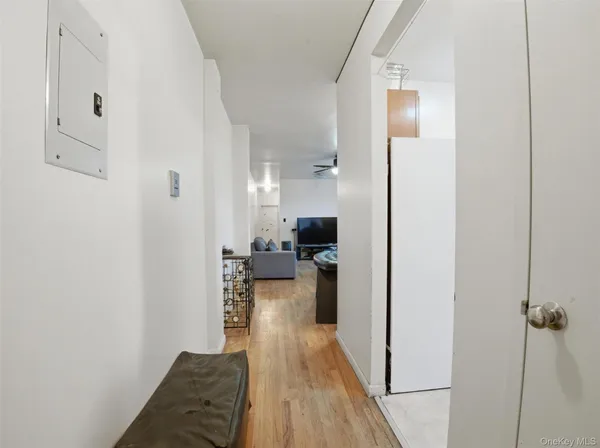 a view of a living room and a wooden floor