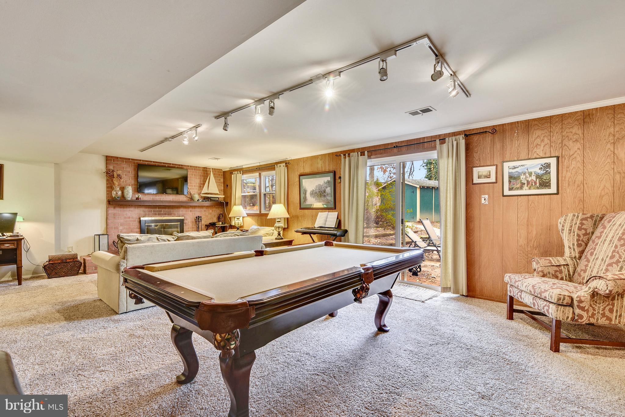 10021 Ranger Road Fairfax, VA 22030 - Photo 24 of 30 Rec Rm with sliding glass door to rear property