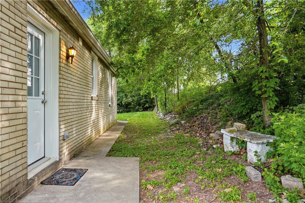 480 Songo Street Pittsburgh, PA 15227 - Photo 30 of 36 a backyard of a house with lots of green space