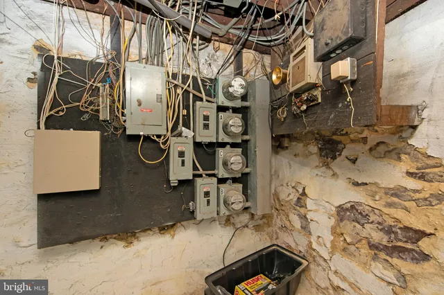 a bathroom with a sink and glass door