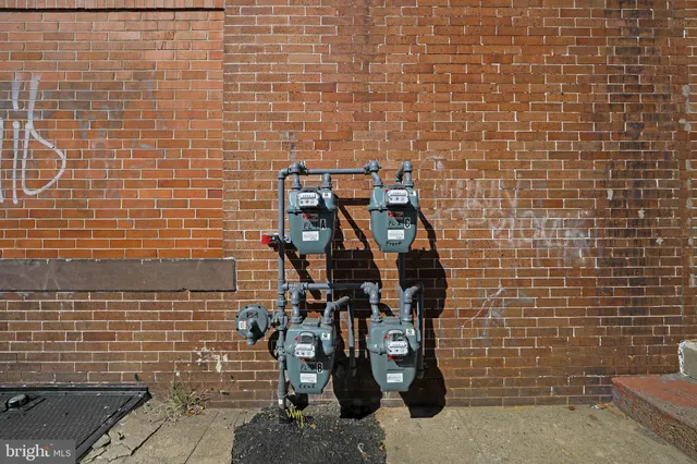 a view of a house with a fence
