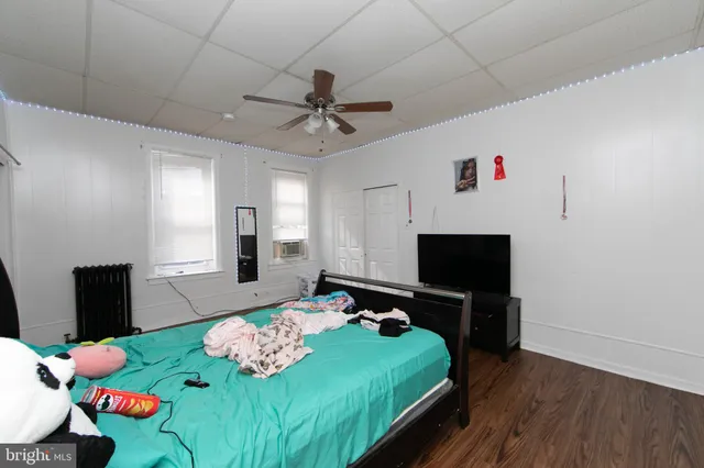 a workspace with furniture and wooden floor
