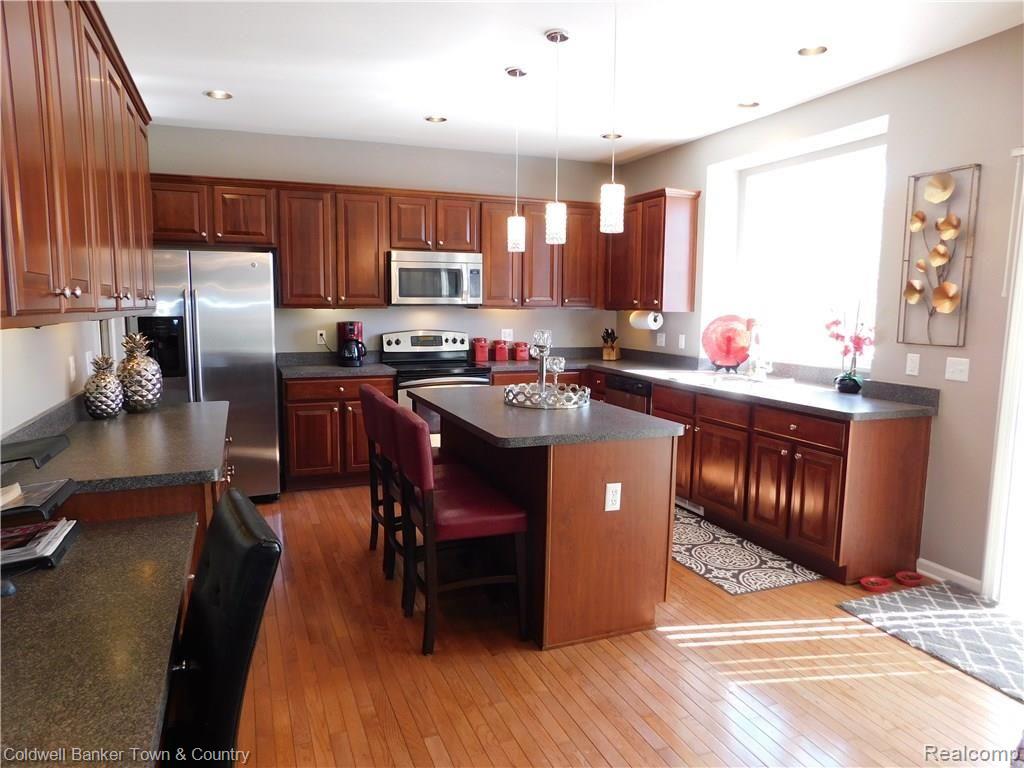 4076 Merriman Loop Howell, MI 48843 - Photo 10 of 65 Island Kitchen.JPG