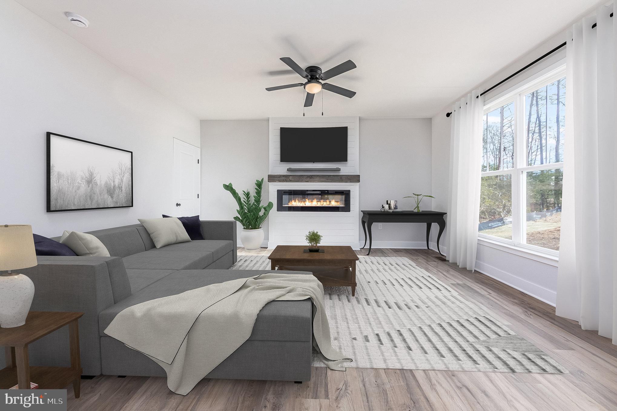 159 Norman Road Stafford, VA 22554 - Photo 15 of 55 a living room with furniture a flat screen tv and a window