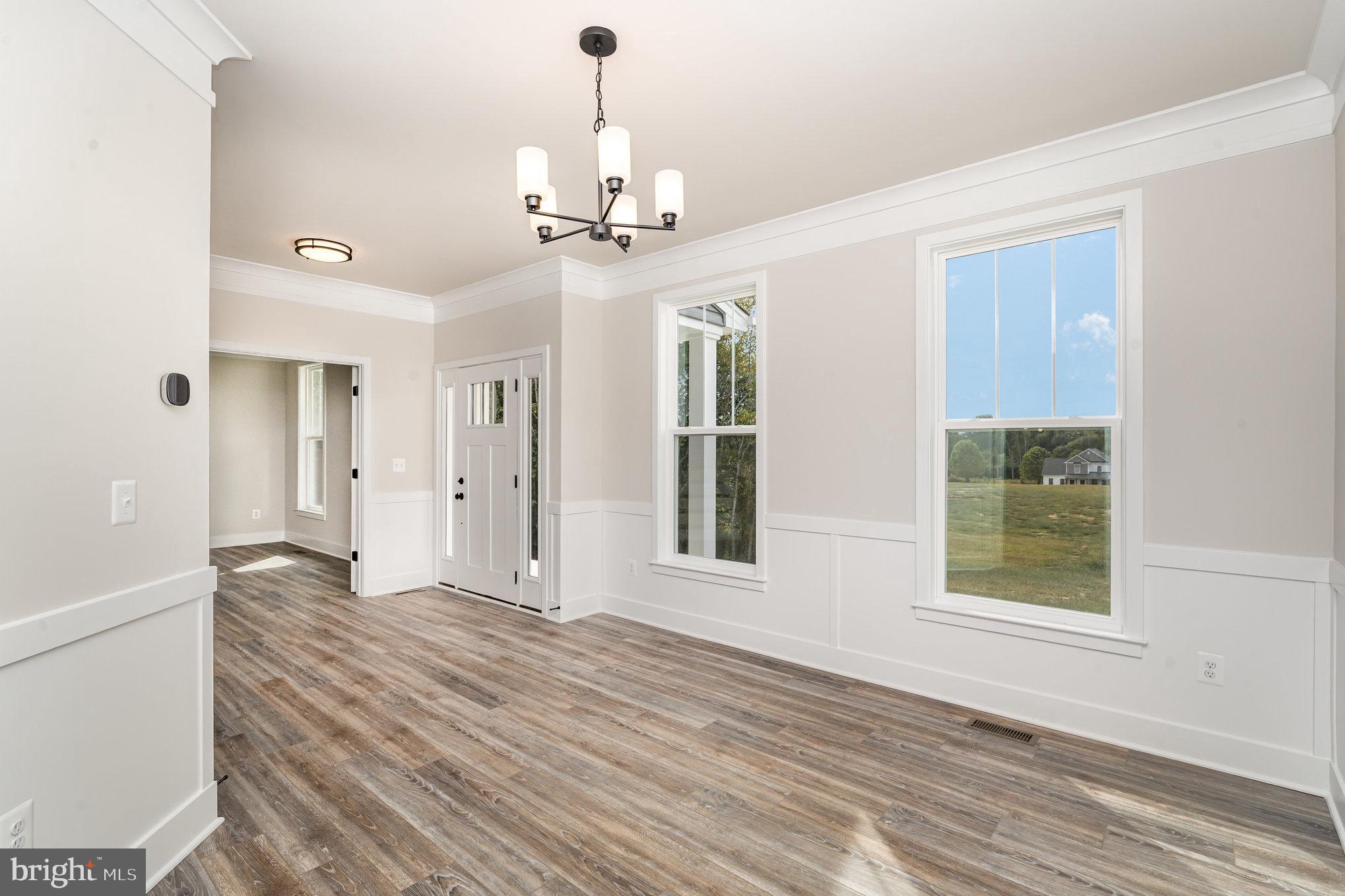159 Norman Road Stafford, VA 22554 - Photo 9 of 55 a view of an empty room with a window