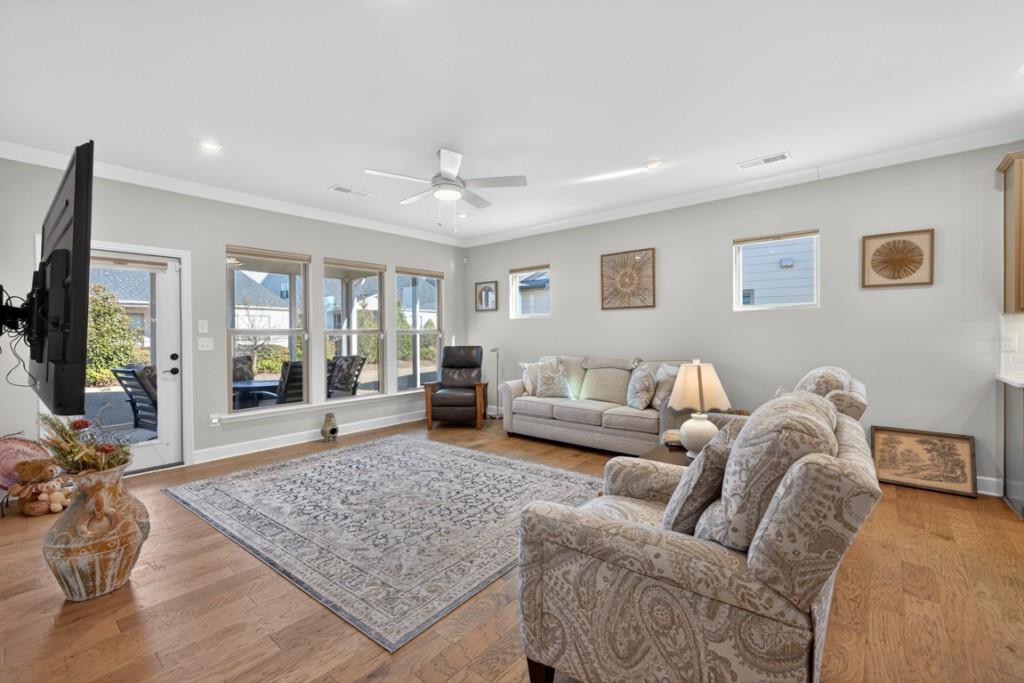 5162 Morrell Road Hoschton, GA 30548 - Photo 17 of 53 a living room with furniture rug and window
