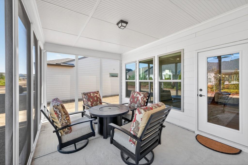 5162 Morrell Road Hoschton, GA 30548 - Photo 32 of 53 a outdoor living space with furniture and a rug