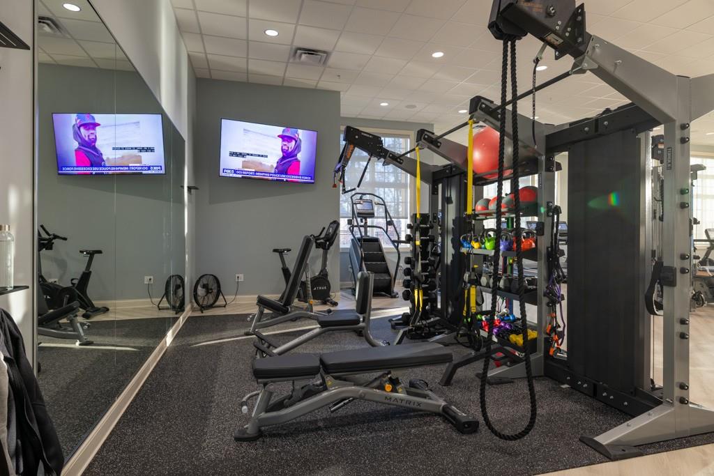 5162 Morrell Road Hoschton, GA 30548 - Photo 43 of 53 a view of a room with gym equipment