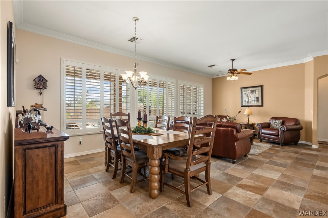 2708 Discovery Road Bullhead City, AZ 86442 - Photo 14 of 90 a view of a dining room with furniture