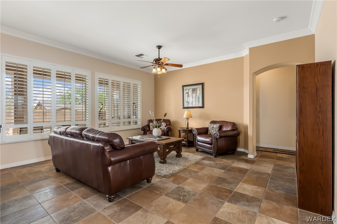 2708 Discovery Road Bullhead City, AZ 86442 - Photo 16 of 90 a living room with furniture and a window