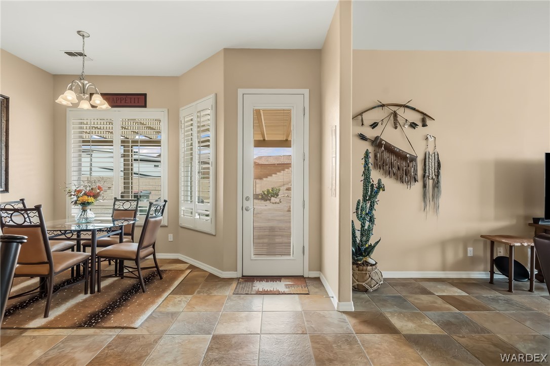 2708 Discovery Road Bullhead City, AZ 86442 - Photo 30 of 90 a view of a livingroom with furniture and windows