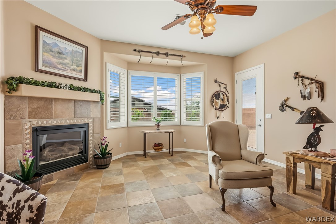 2708 Discovery Road Bullhead City, AZ 86442 - Photo 33 of 90 a living room with furniture and a fireplace