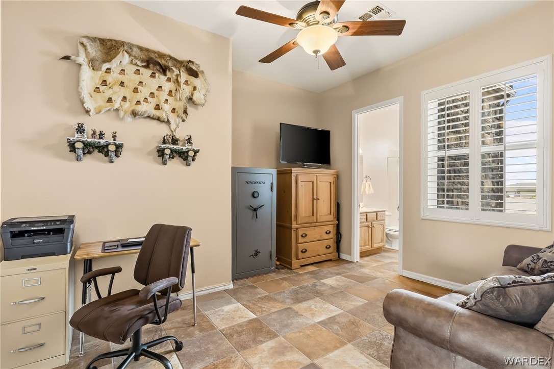 2708 Discovery Road Bullhead City, AZ 86442 - Photo 41 of 90 a view of a livingroom with workspace and a window