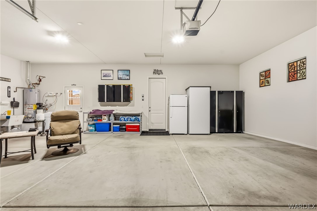 2708 Discovery Road Bullhead City, AZ 86442 - Photo 63 of 90 a view of a livingroom with furniture and a flat screen tv
