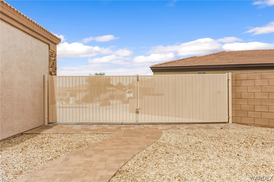 2708 Discovery Road Bullhead City, AZ 86442 - Photo 75 of 90 a view of a backyard with wooden fence