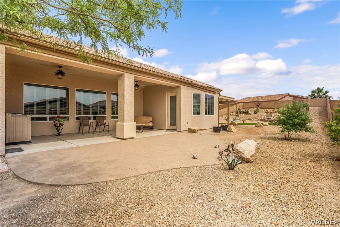 2708 Discovery Road Bullhead City, AZ 86442 - Photo 79 of 90 The property features an extensive outdoor patio area with an overhead covering, providing a comfortable space for relaxation