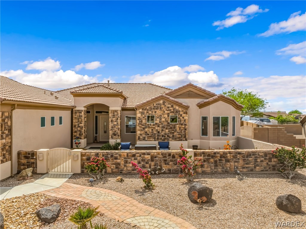 2708 Discovery Road Bullhead City, AZ 86442 - Photo 7 of 90 a view of a house with a patio