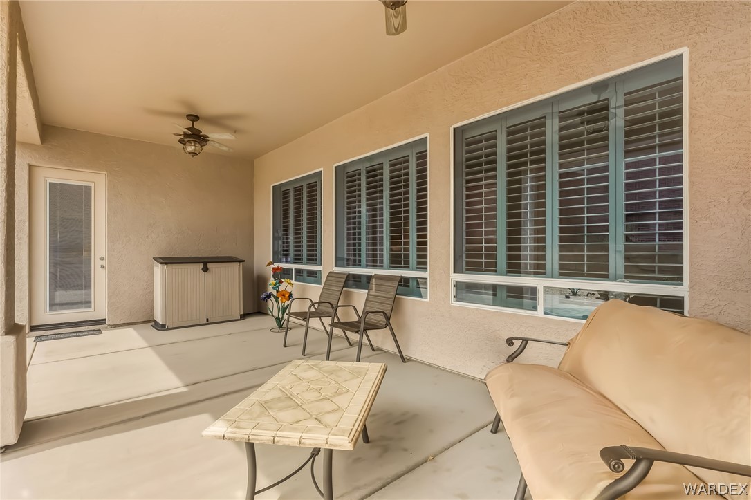 2708 Discovery Road Bullhead City, AZ 86442 - Photo 80 of 90 a living room with furniture a window and a table