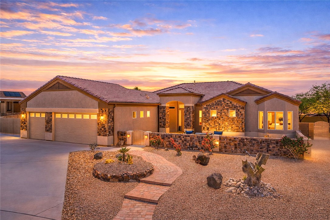 2708 Discovery Road Bullhead City, AZ 86442 - Photo 89 of 90 a front view of a house with a yard