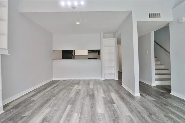 a kitchen with stainless steel appliances granite countertop a stove and a sink