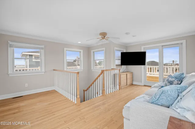 a front view of a residential apartment building with glass windows