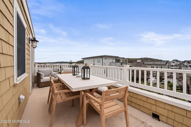 a view of a house with a yard and pathway
