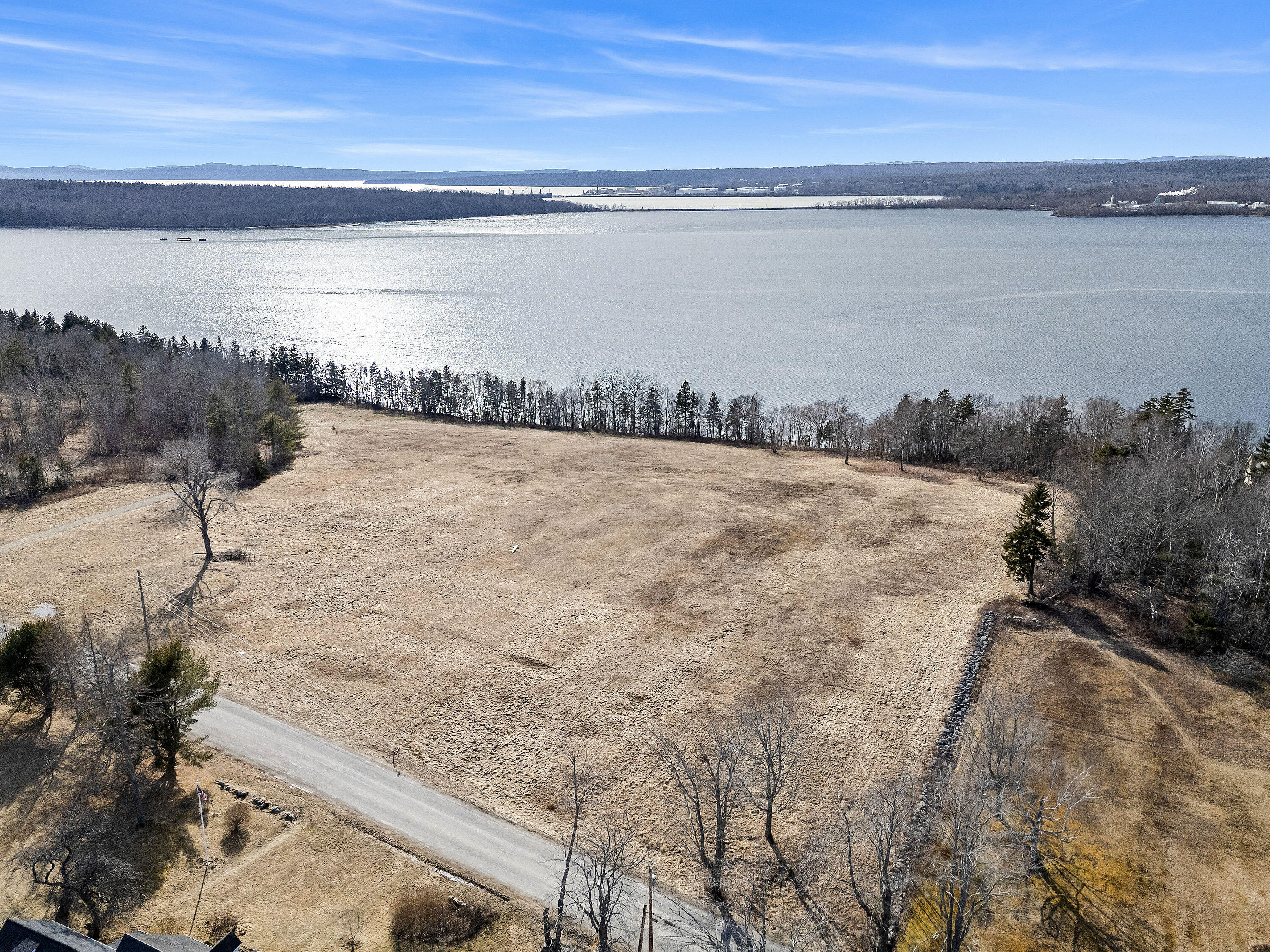 531 Cape Jellison Road Stockton Springs, ME 04981 - Photo 9 of 18 aerial across harbor