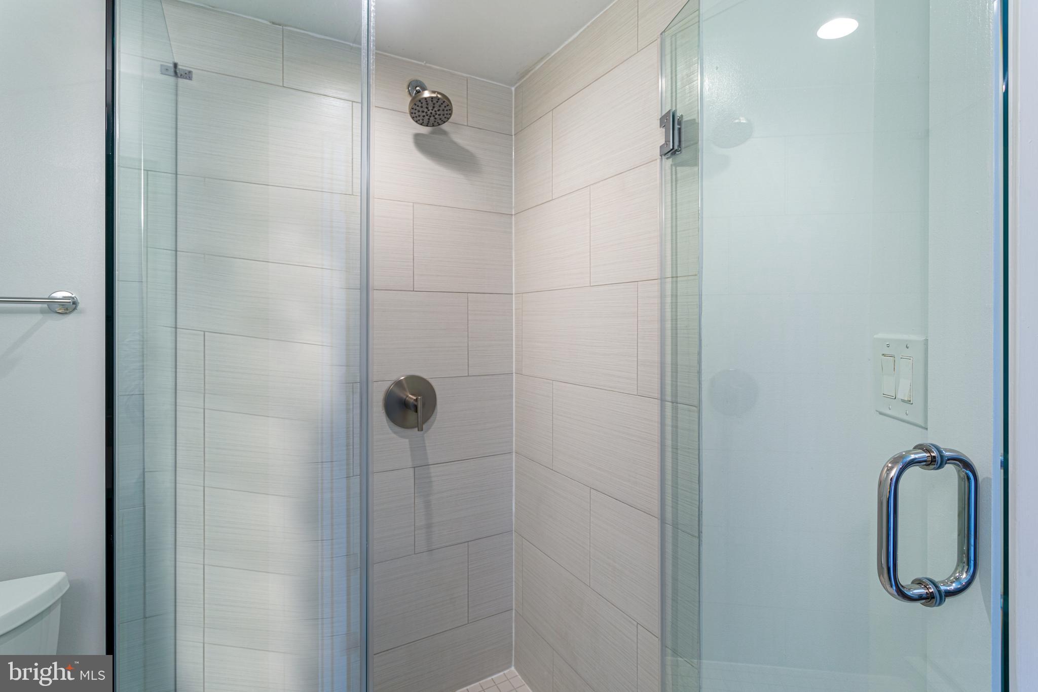 1219 K Street Northeast, Unit 209 Washington, DC 20002 - Photo 9 of 12 a bathroom with a shower