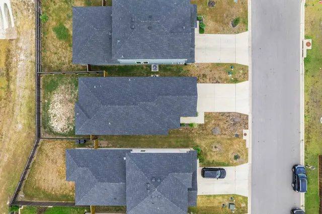 a aerial view of a house with garden