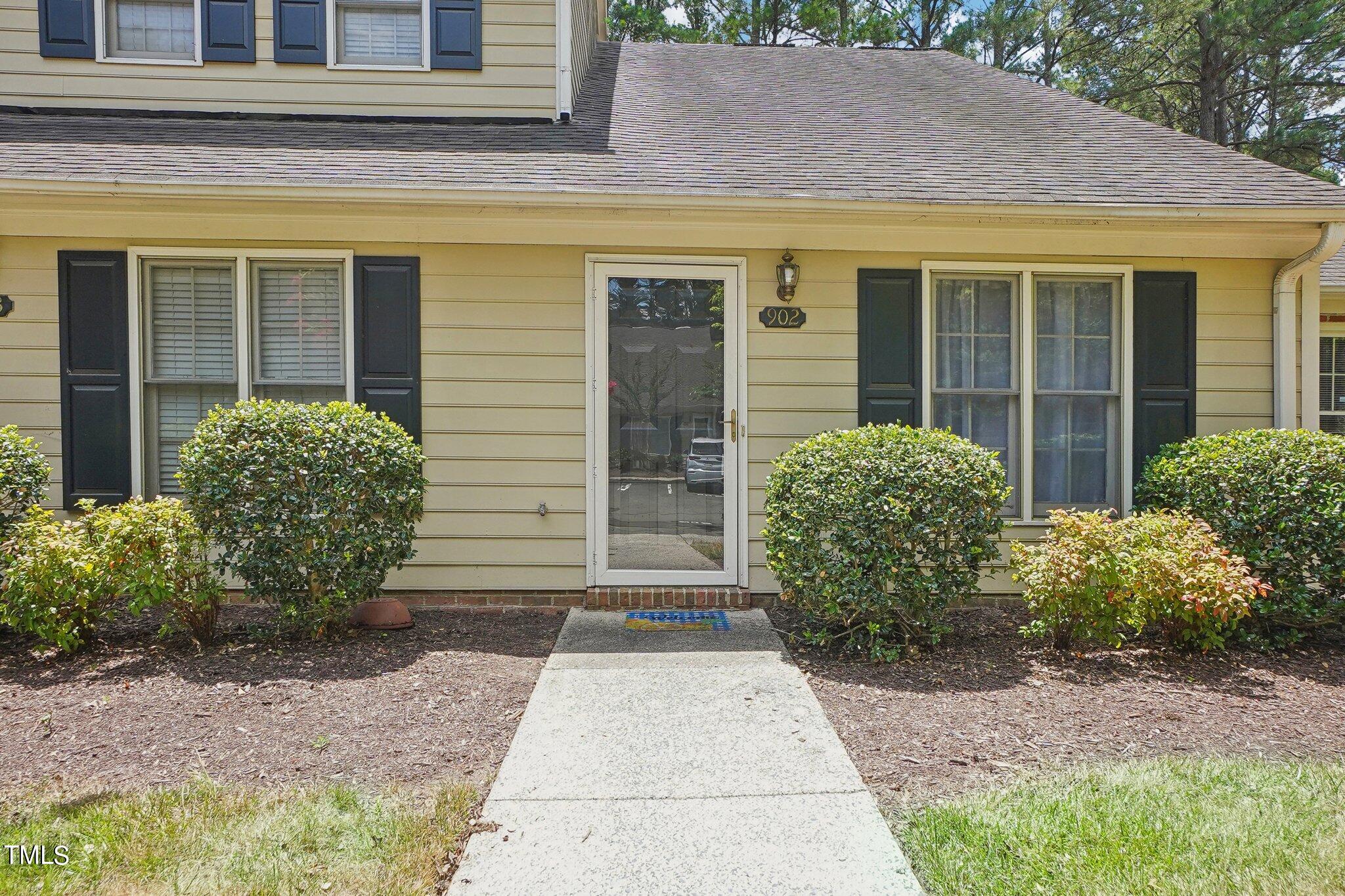 902 Gatehouse Lane Durham, NC 27707 - Photo 2 of 17 a view of entrance front of house