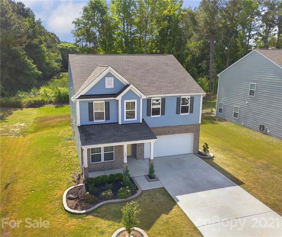 3097 Riker Street Clover, SC 29710 - Photo 2 of 39 a house view with a garden space