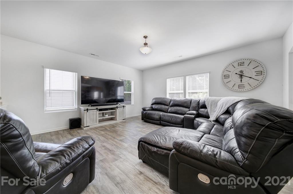 3097 Riker Street Clover, SC 29710 - Photo 13 of 39 a living room with furniture and a flat screen tv