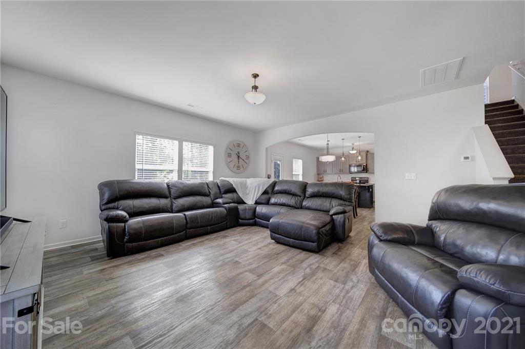 3097 Riker Street Clover, SC 29710 - Photo 14 of 39 a living room with furniture and a wooden floor
