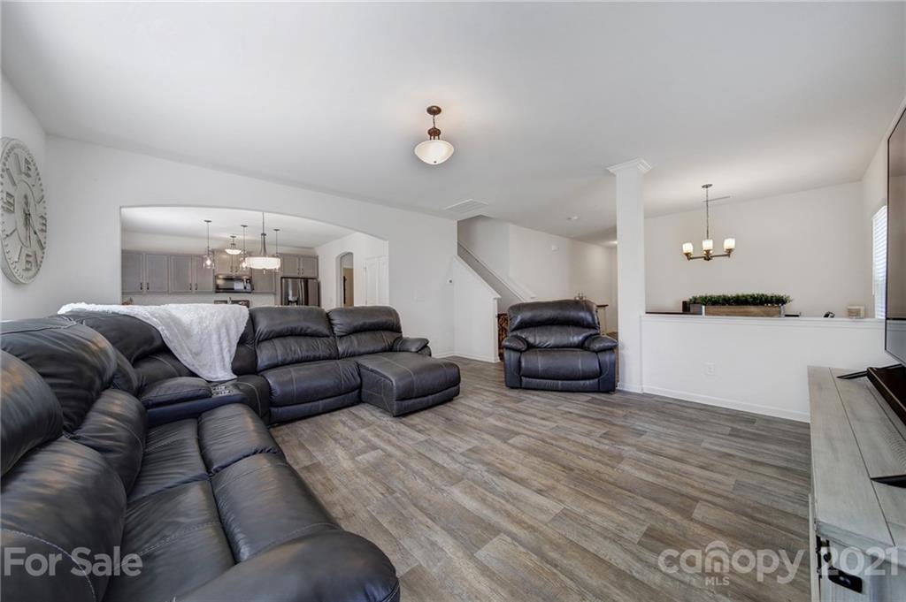 3097 Riker Street Clover, SC 29710 - Photo 15 of 39 a living room with furniture and a wooden floor