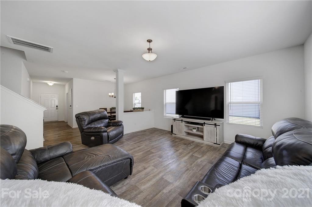3097 Riker Street Clover, SC 29710 - Photo 16 of 39 a living room with furniture and a flat screen tv