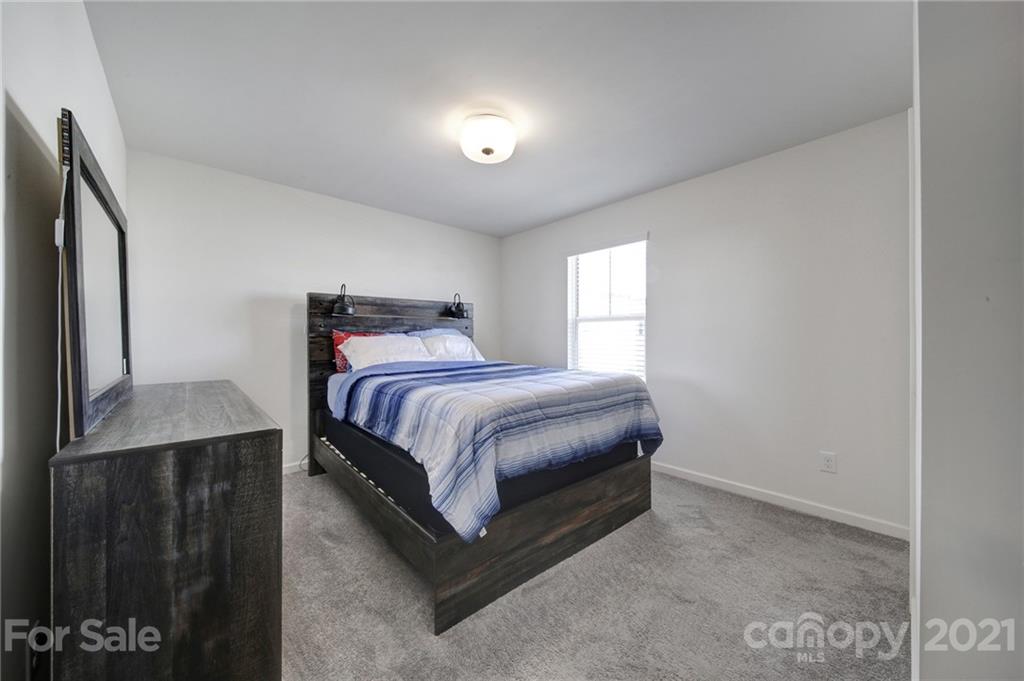 3097 Riker Street Clover, SC 29710 - Photo 28 of 39 a bedroom with a bed and window