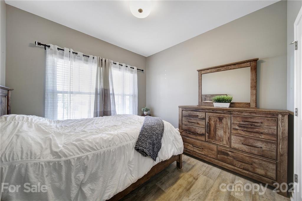 3097 Riker Street Clover, SC 29710 - Photo 6 of 39 a bedroom with a bed and a dresser