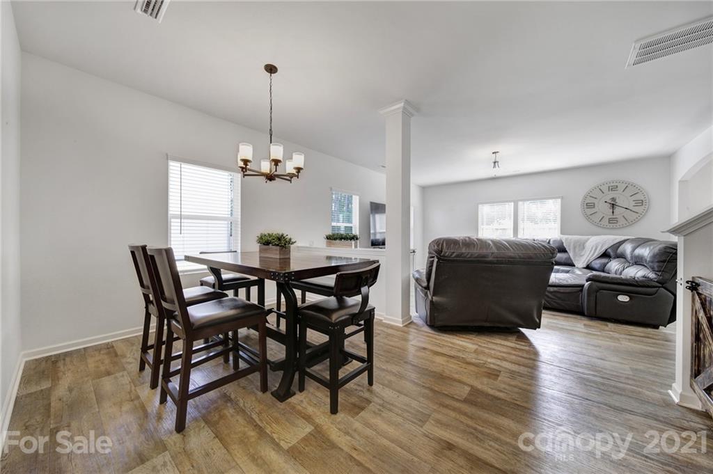 3097 Riker Street Clover, SC 29710 - Photo 9 of 39 a view of a dining room with furniture and wooden floor
