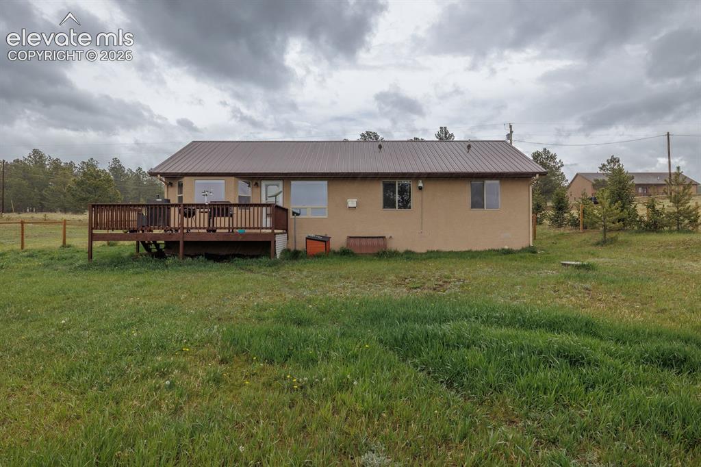471 Due S Road Florissant, CO 80816 - Photo 6 of 35 a view of a house with a garden