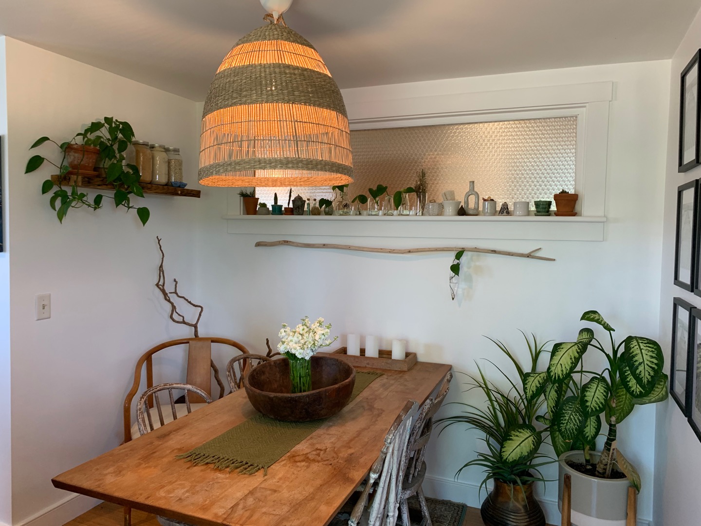5 Salros Road Nantucket, MA 02554 - Photo 6 of 24 a kitchen with a table and a potted plant